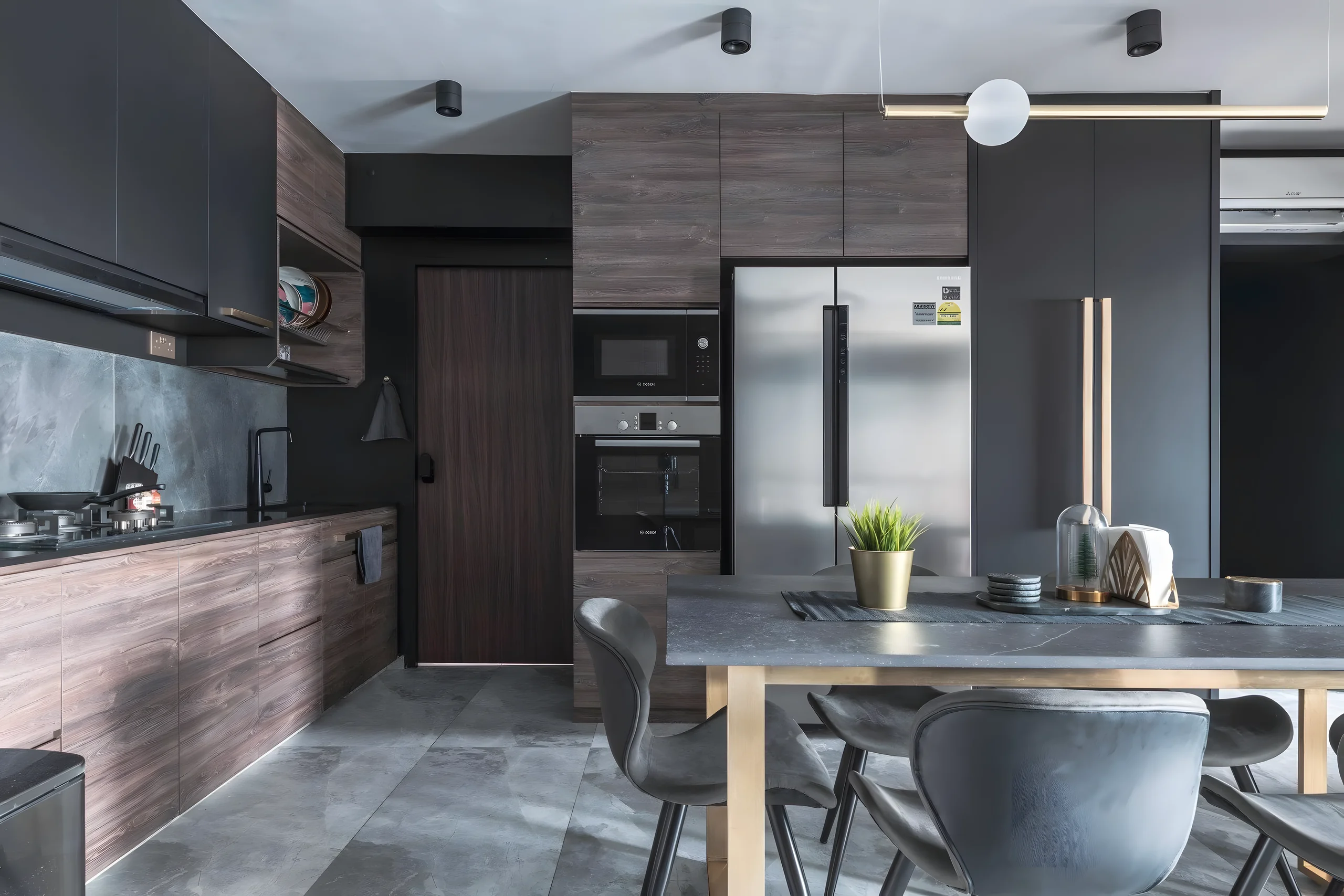 Dark walnut and black kitchen with brass details